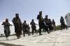 Taliban fighters patrol in Kabul, Afghanistan, Thursday,