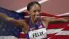 Allyson Felix, of United States smiles after taking the