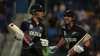 New Zealand's Daryl Mitchell, right, and Mitchell Santner celebrate winning the Cricket Twenty20 Wor